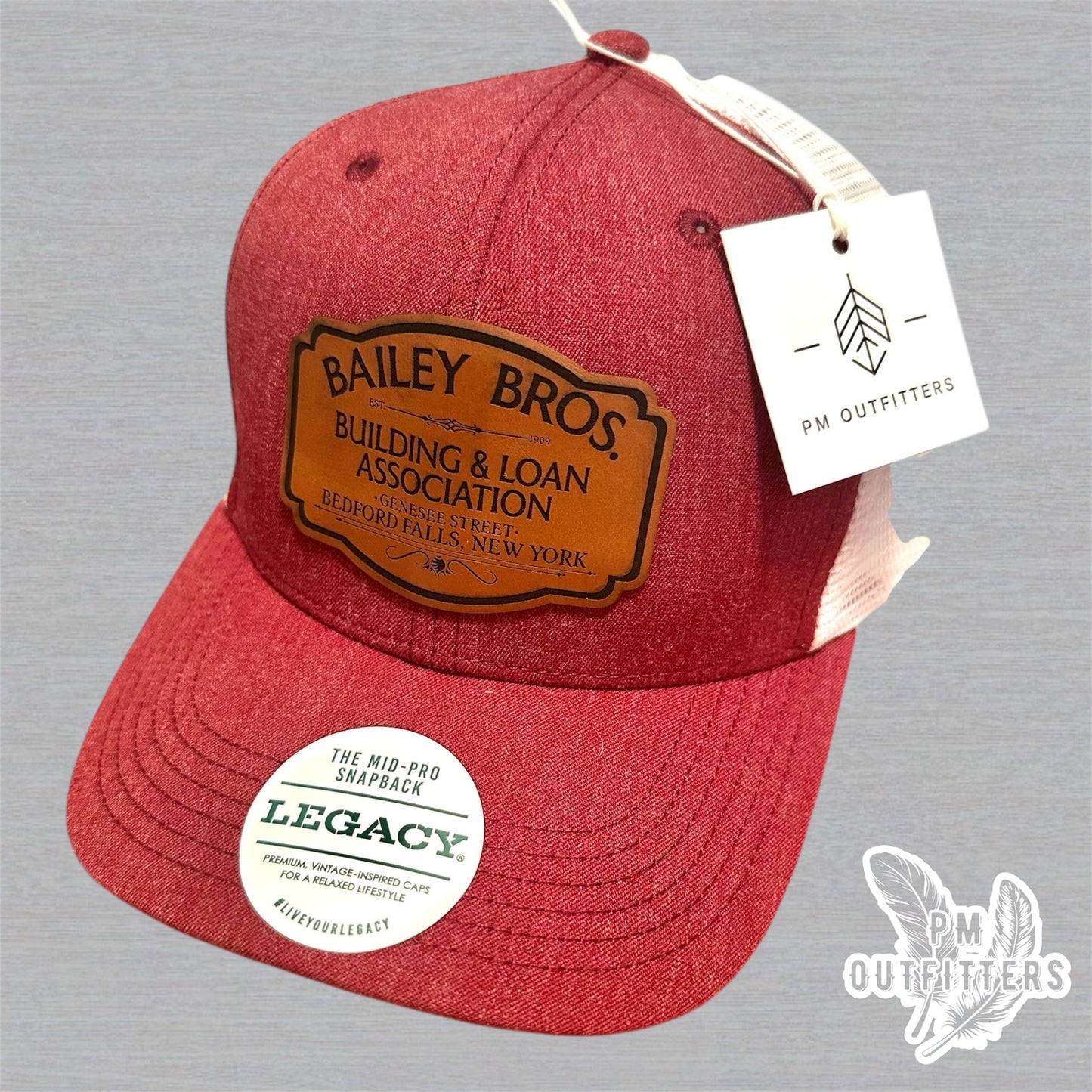 Custom Bailey Brothers Building & Loan Patch Hat – Maroon & White Legacy Mid-Pro Snapback | PM Outfitters