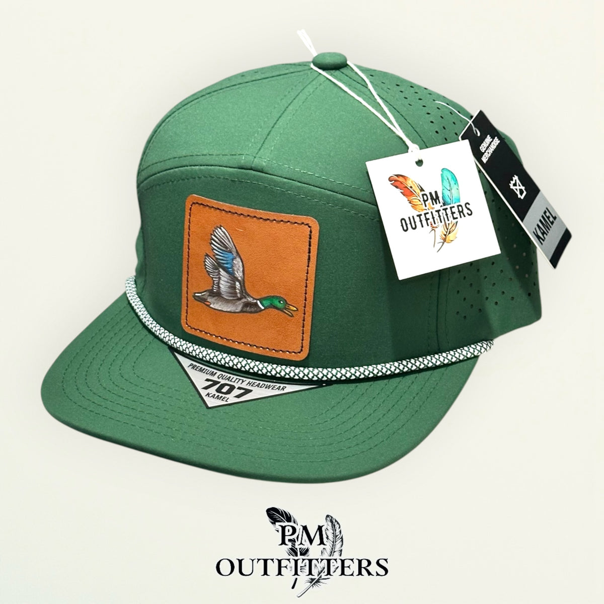 Hand-painted mallard duck performance rope cap displayed with PM Outfitters branded hang tag
