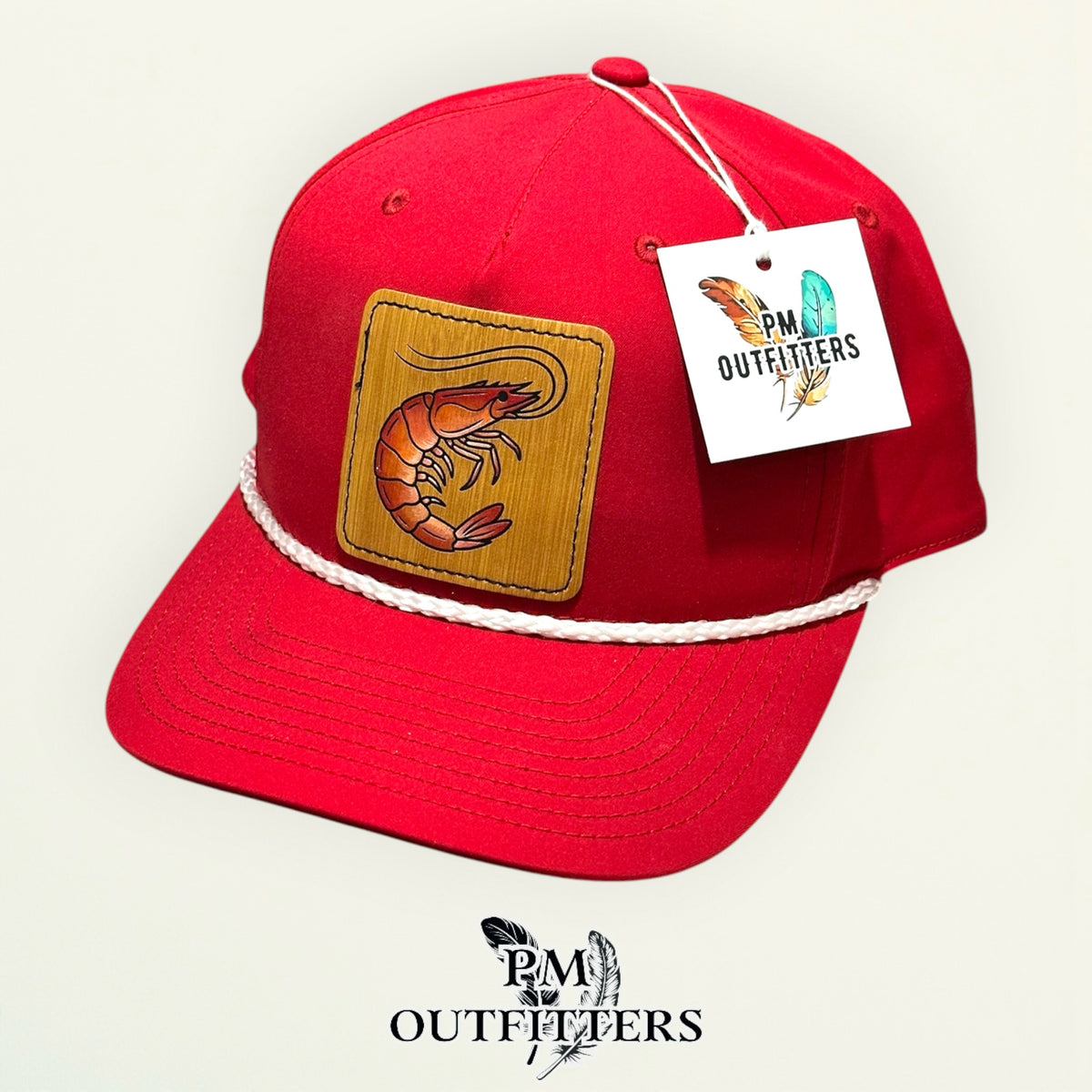 Hand-painted Gulf shrimp patch on a red Richardson 258 rope trucker hat with white trim, PM Outfitters True Originals