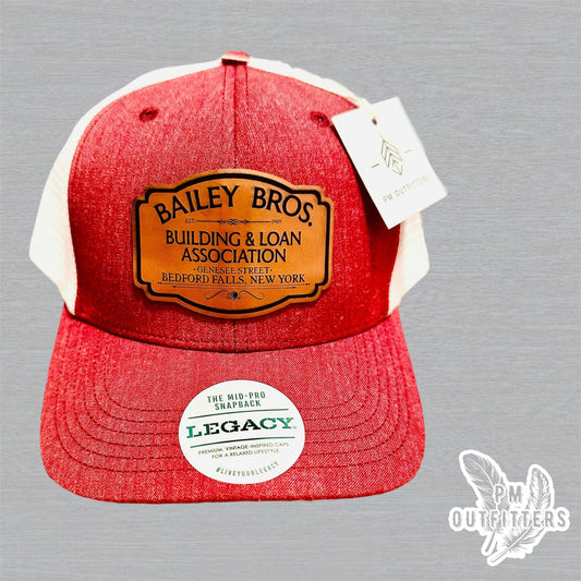 Custom Bailey Brothers Building & Loan Patch Hat – Maroon & White Legacy Mid-Pro Snapback | PM Outfitters