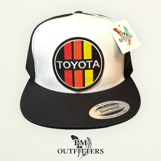 Toyota Retro Stripes Trucker Hat — PM Outfitters Racing Patch | Yupoong Flat Bill White Black Motorsports Heritage