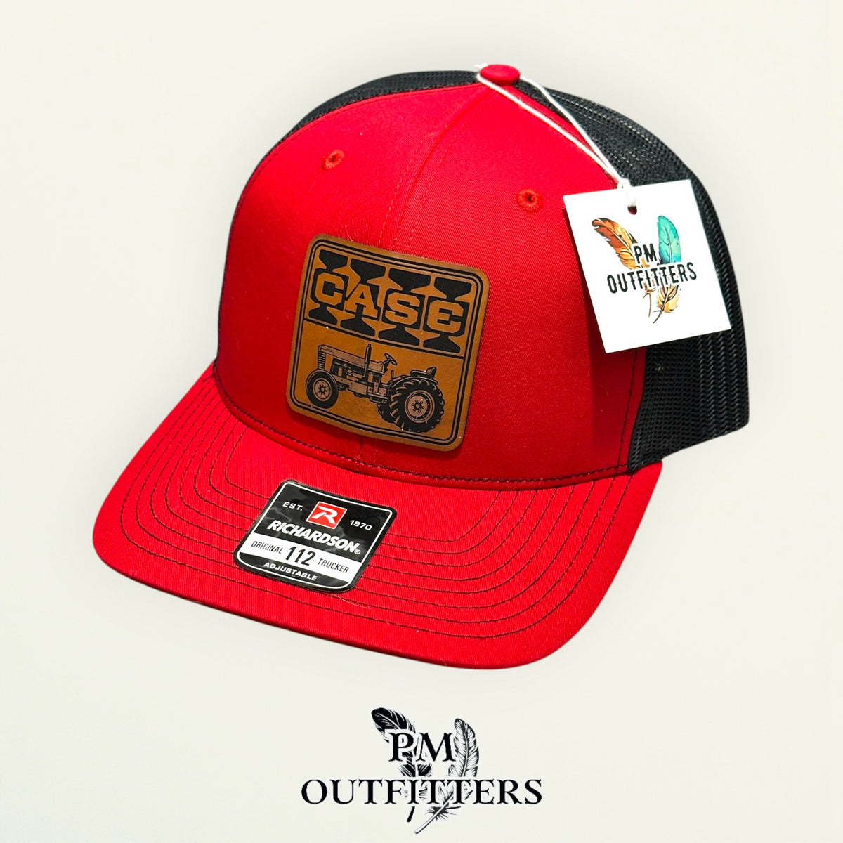PM Outfitters hang tag Case red black trucker hat