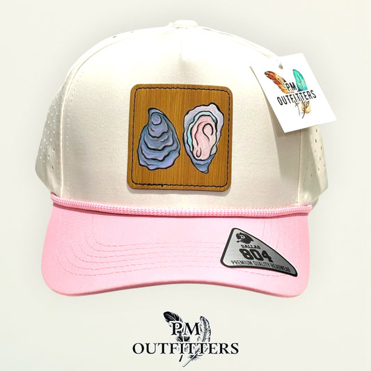 Hand-painted Gulf oyster patch on a cream and pink Dallas 804 waterproof rope trucker hat, PM Outfitters True Originals