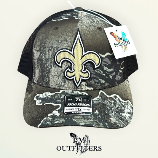 PM Outfitters New Orleans Saints fleur-de-lis embroidered patch Richardson 112 Realtree Excape camo trucker hat
