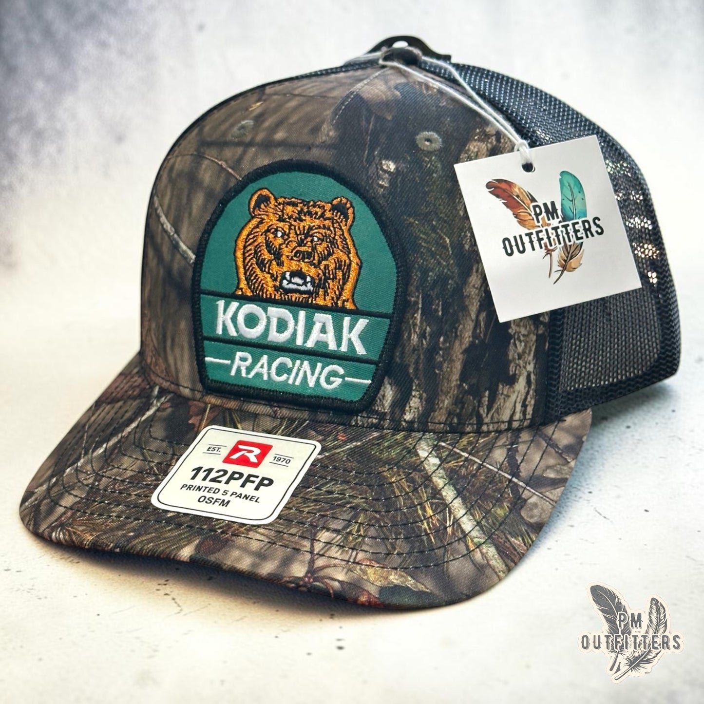 Kodiak Racing Trucker Hat – PM Outfitters Bear Patch | Richardson 112 Mossy Oak Country DNA Camo