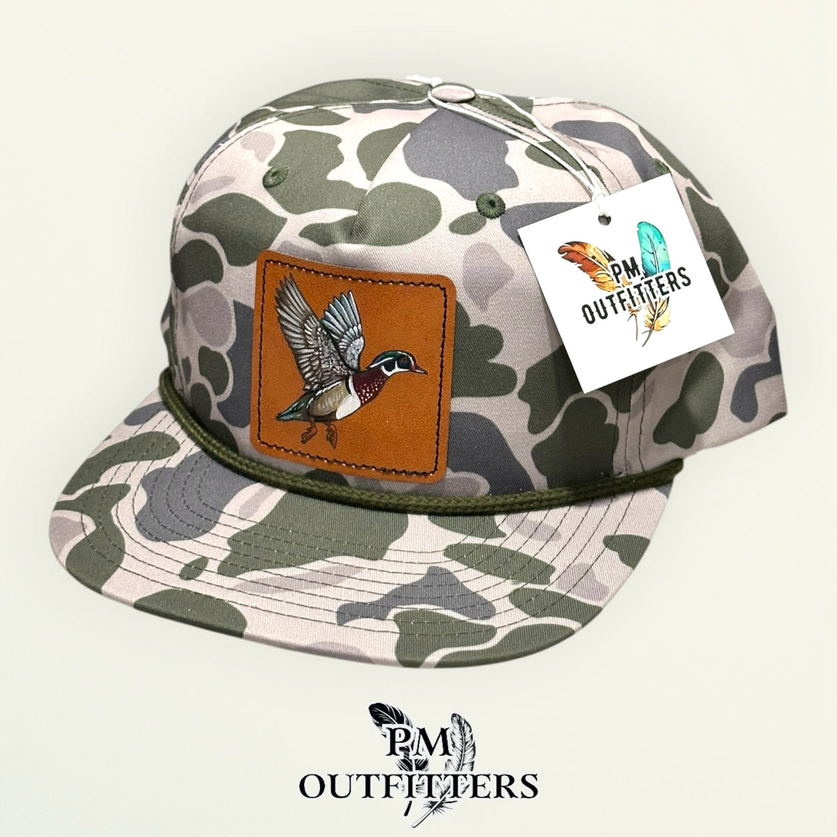 Hand-painted Wood Duck patch on a marsh duck camo Richardson 256P rope trucker hat, PM Outfitters True Originals