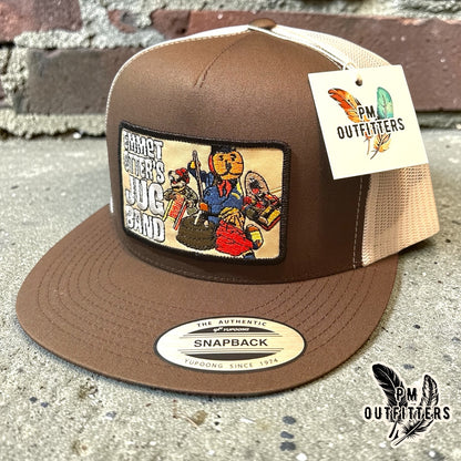 Emmet Otter's Jug Band Trucker Hat — PM Outfitters Retro Patch | Yupoong Flat Bill Brown White Jim Henson Heritage