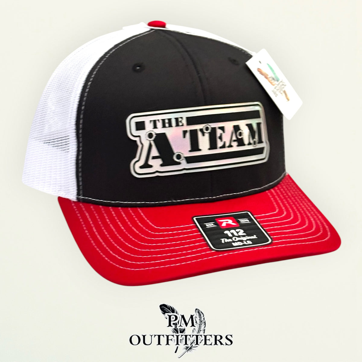 The A-Team trucker hat profile view red brim black front
