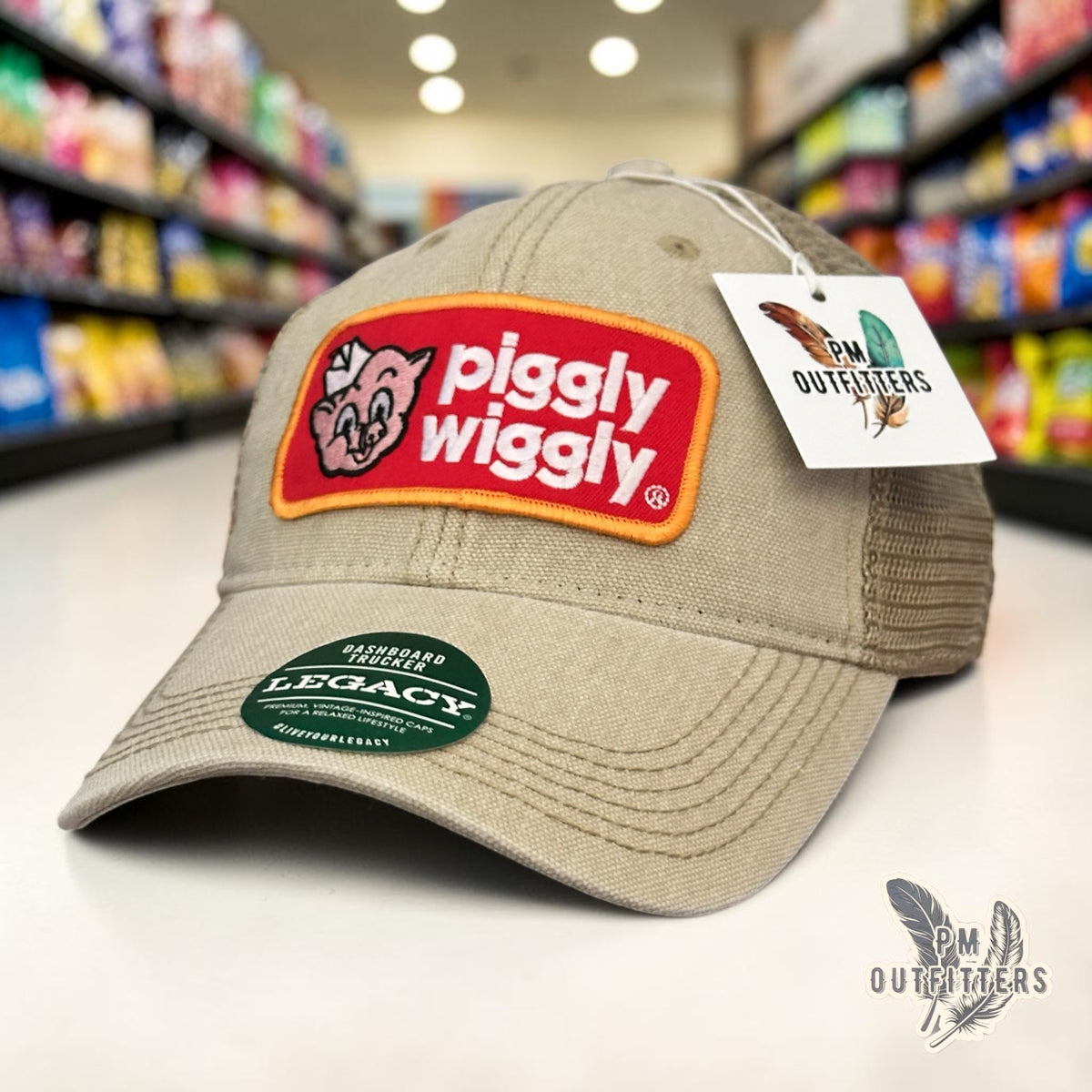 PM Outfitters Piggly Wiggly trucker hat beige Legacy Dashboard retro embroidered pig mascot patch