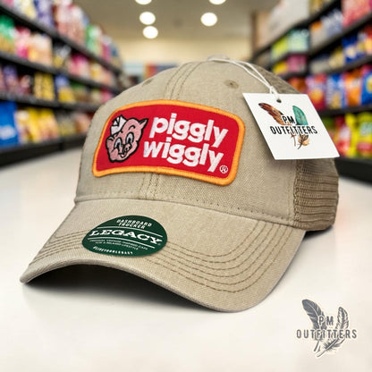PM Outfitters Piggly Wiggly trucker hat beige Legacy Dashboard retro embroidered pig mascot patch