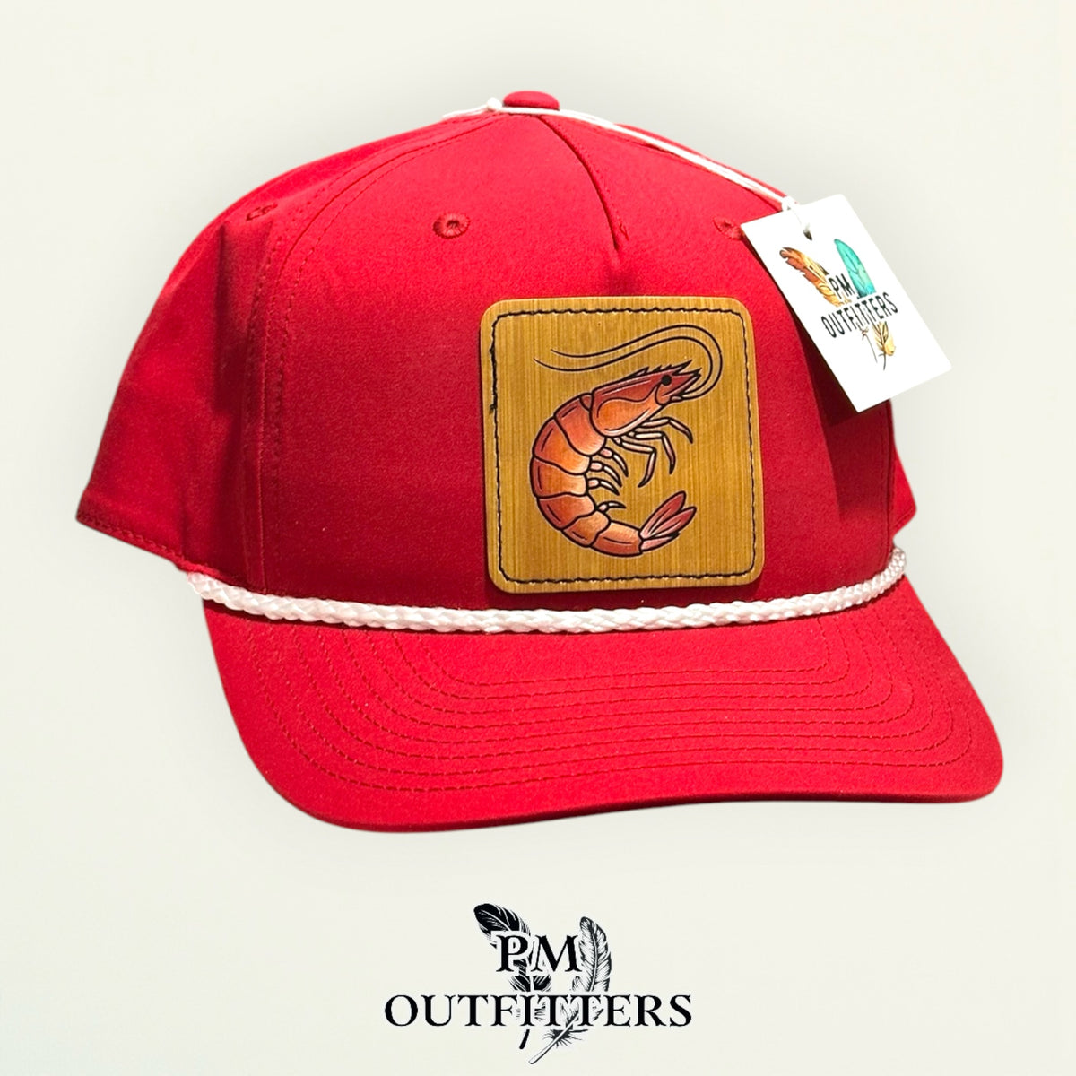 Hand-painted Gulf shrimp patch on a red Richardson 258 rope trucker hat with white trim, PM Outfitters True Originals