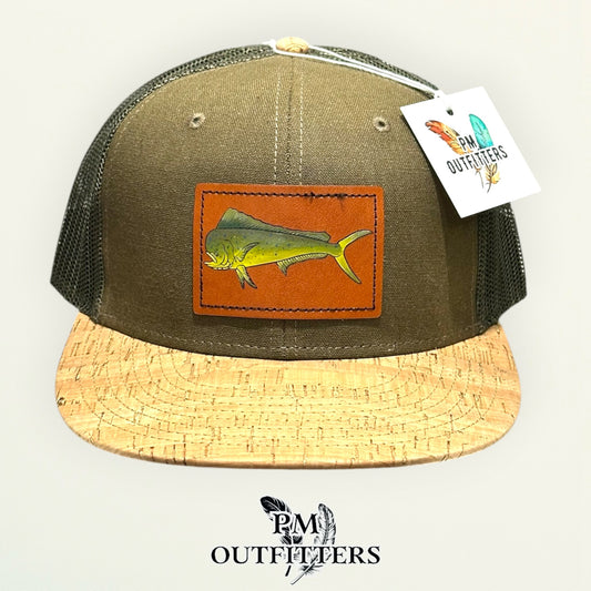 Hand-painted mahi-mahi patch on an olive Otto 141 cork-bill trucker hat, PM Outfitters True Originals