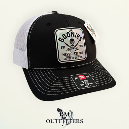 The Goonies Never Say Die Trucker Hat – PM Outfitters Holographic Vegan Leather Patch | Richardson 112 Black White