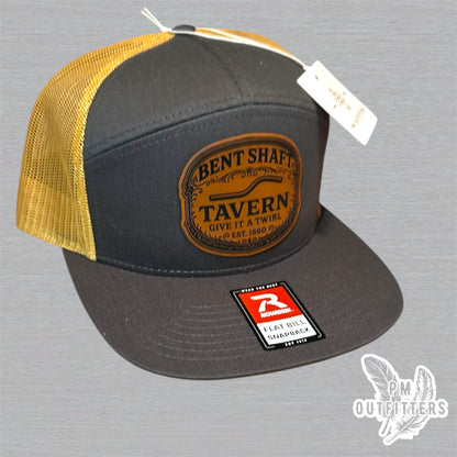 Bent Shaft Tavern Trucker Hat - Custom Leatherette Patch Richardson 168 | Grey Gold Flat Bill Humor Cap