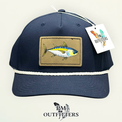 Side view of the hand-painted yellowfin tuna patch on the navy Richardson 258 rope cap, PM Outfitters True Originals