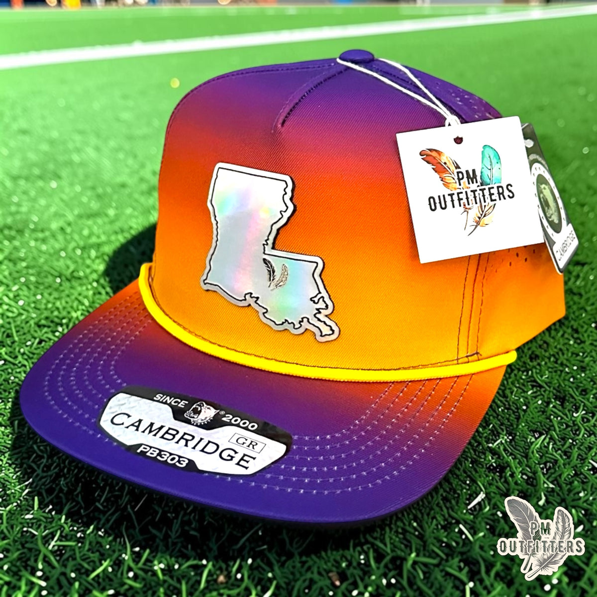PM Outfitters LSU Tailgate Season holographic vegan leather Louisiana state outline patch trucker hat Baton Rouge two-feather logo purple gold gradient