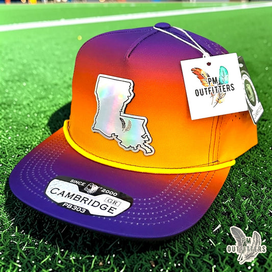 PM Outfitters LSU Tailgate Season holographic vegan leather Louisiana state outline patch trucker hat Baton Rouge two-feather logo purple gold gradient