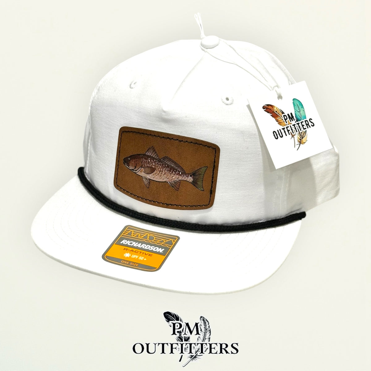 Hand-painted redfish performance rope cap displayed with PM Outfitters branded hang tag