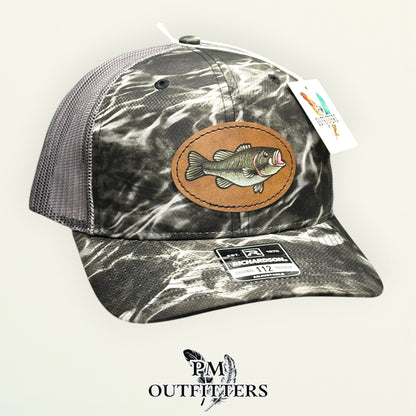 Mossy Oak Elements Blacktip camo Richardson 112 trucker hat with hand-painted bass patch, angled view, PM Outfitters True Originals