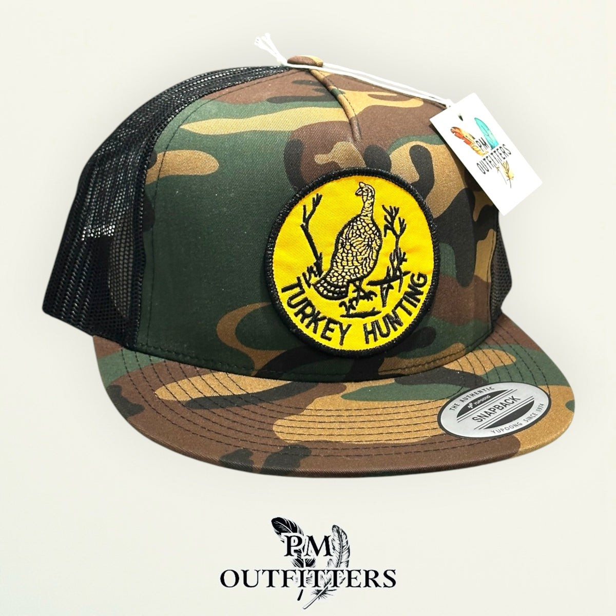 Woodland camo Turkey Hunting trucker hat, angled view, PM Outfitters