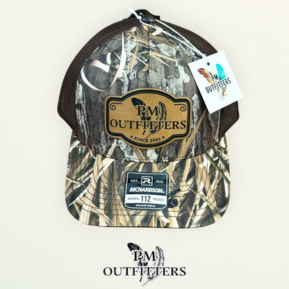 PM Outfitters trucker hat black mesh back Mossy Oak Habitat camo Richardson 112