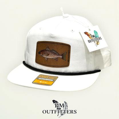 Back of the white Richardson 256 rope cap showing the adjustable snap closure, PM Outfitters True Originals