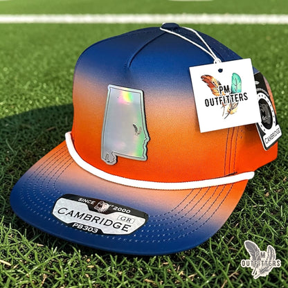 PM Outfitters Auburn Tailgate Season holographic vegan leather Alabama state outline patch trucker hat Auburn two-feather logo blue orange gradient