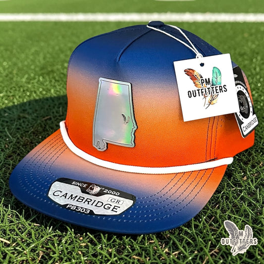 PM Outfitters Auburn Tailgate Season holographic vegan leather Alabama state outline patch trucker hat Auburn two-feather logo blue orange gradient