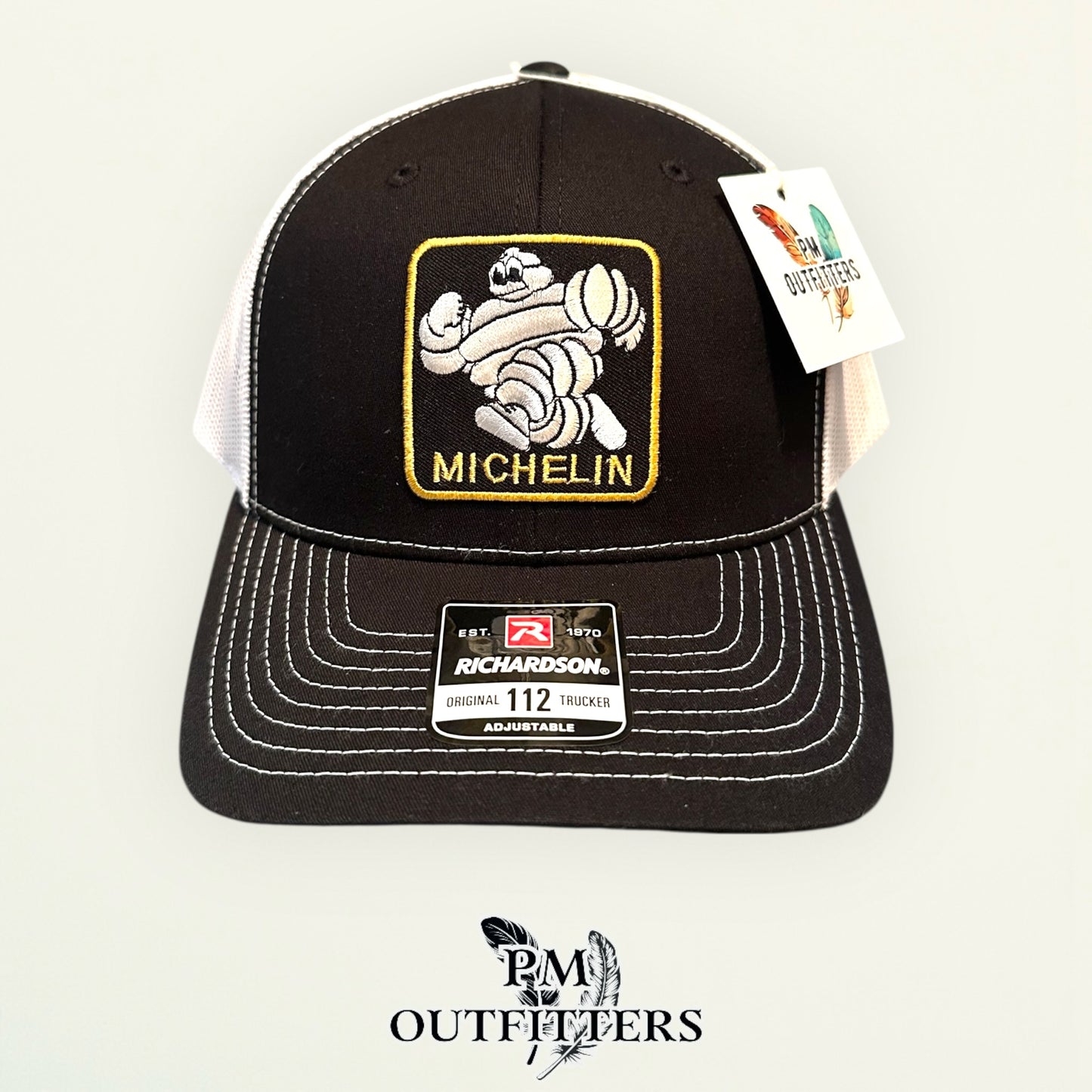 Michelin Man Trucker Hat — Retro Embroidered Patch | Richardson 112 Black White