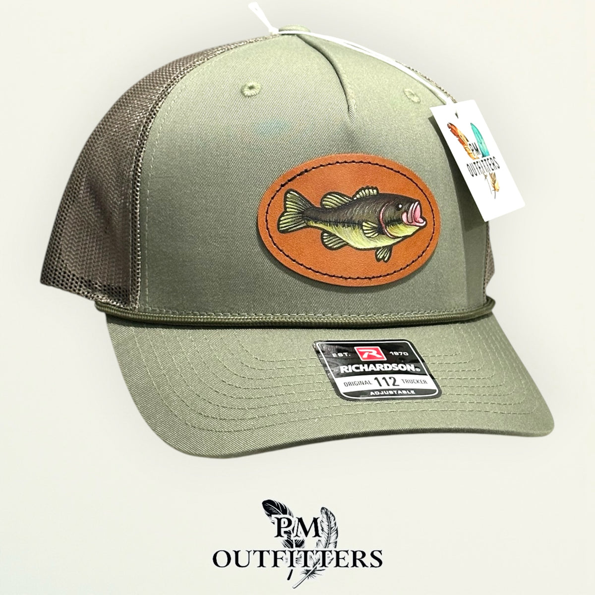 Loden green Richardson 112 trucker hat with hand-painted bass patch, angled view, PM Outfitters True Originals