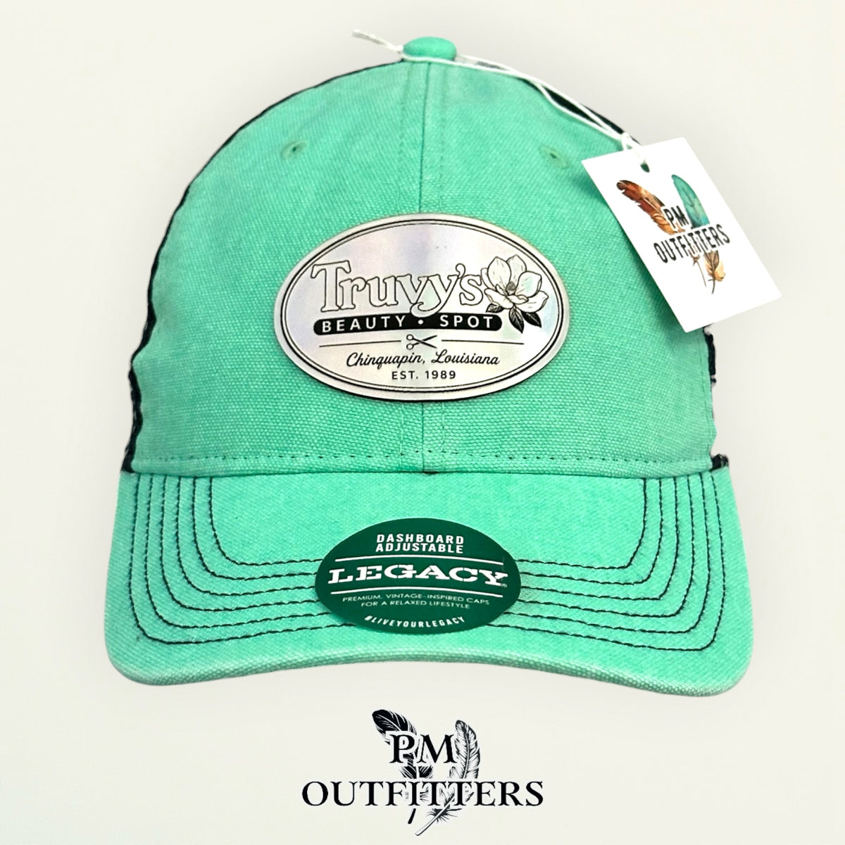Truvy's Beauty Spot trucker hat navy mesh back Legacy Dashboard mint