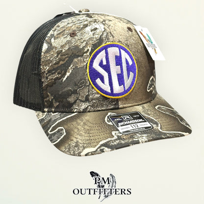 LSU SEC Jersey Patch Trucker Hat | PM Outfitters Richardson 112 Realtree Excape Camo | Purple & Gold