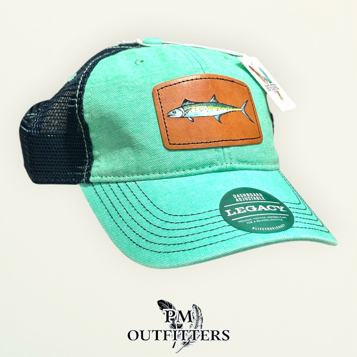 Hand-painted Spanish mackerel patch on a mint Legacy Dashboard trucker hat with black mesh back, PM Outfitters True Originals