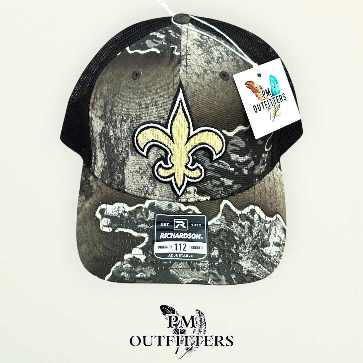 PM Outfitters New Orleans Saints fleur-de-lis embroidered patch Richardson 112 Realtree Excape camo trucker hat