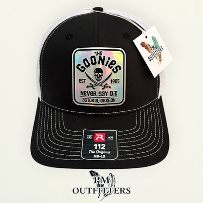 The Goonies Never Say Die Trucker Hat – PM Outfitters Holographic Vegan Leather Patch | Richardson 112 Black White