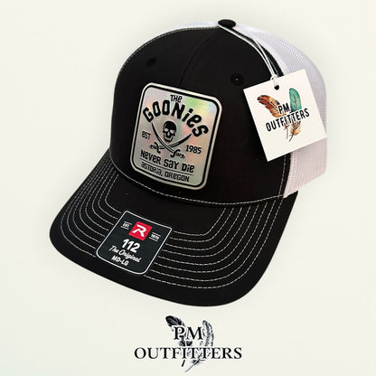The Goonies Never Say Die Trucker Hat – PM Outfitters Holographic Vegan Leather Patch | Richardson 112 Black White