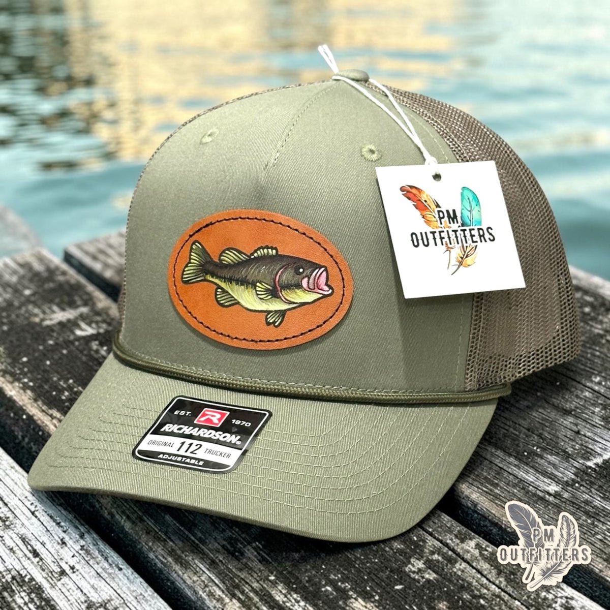 Hand-painted largemouth bass patch on a loden green Richardson 112 trucker hat, PM Outfitters True Originals