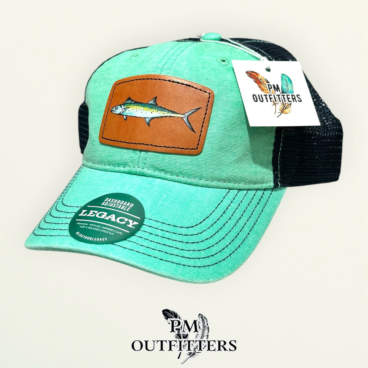 Hand-painted Spanish mackerel patch on a mint Legacy Dashboard trucker hat with black mesh back, PM Outfitters True Originals