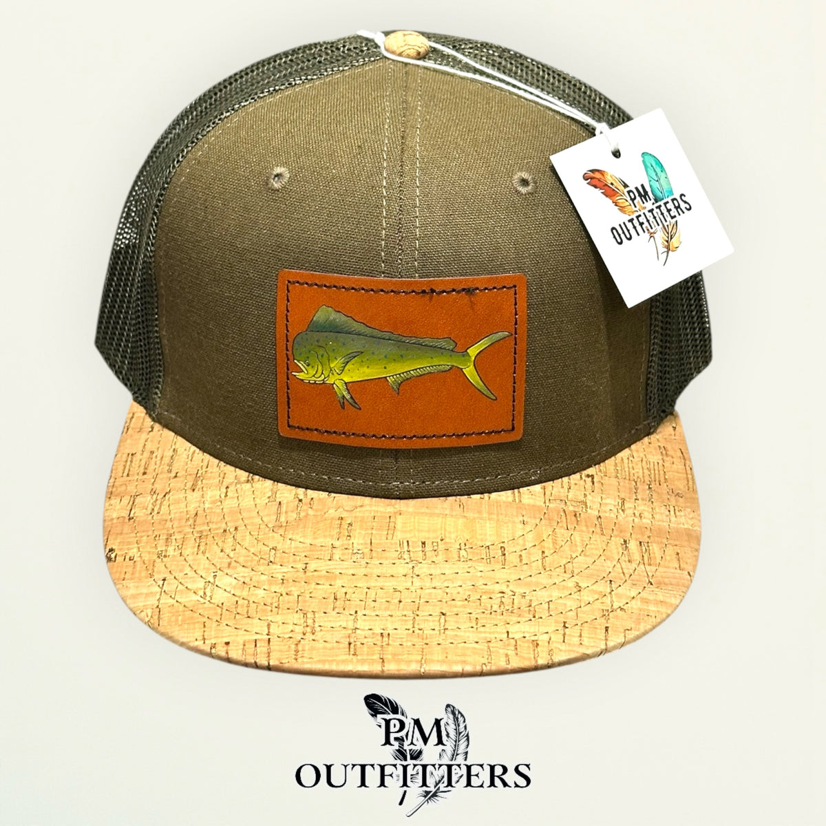 Hand-painted mahi-mahi patch on an olive Otto 141 cork-bill trucker hat, PM Outfitters True Originals