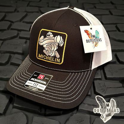 Michelin Man Trucker Hat — Retro Embroidered Patch | Richardson 112 Black White