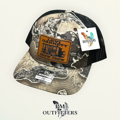PM Outfitters hang tag Levi Garrett Chew Crew camo trucker hat
