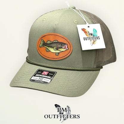 Back of the loden green Richardson 112 trucker hat showing the mesh panels and snapback closure, PM Outfitters True Originals