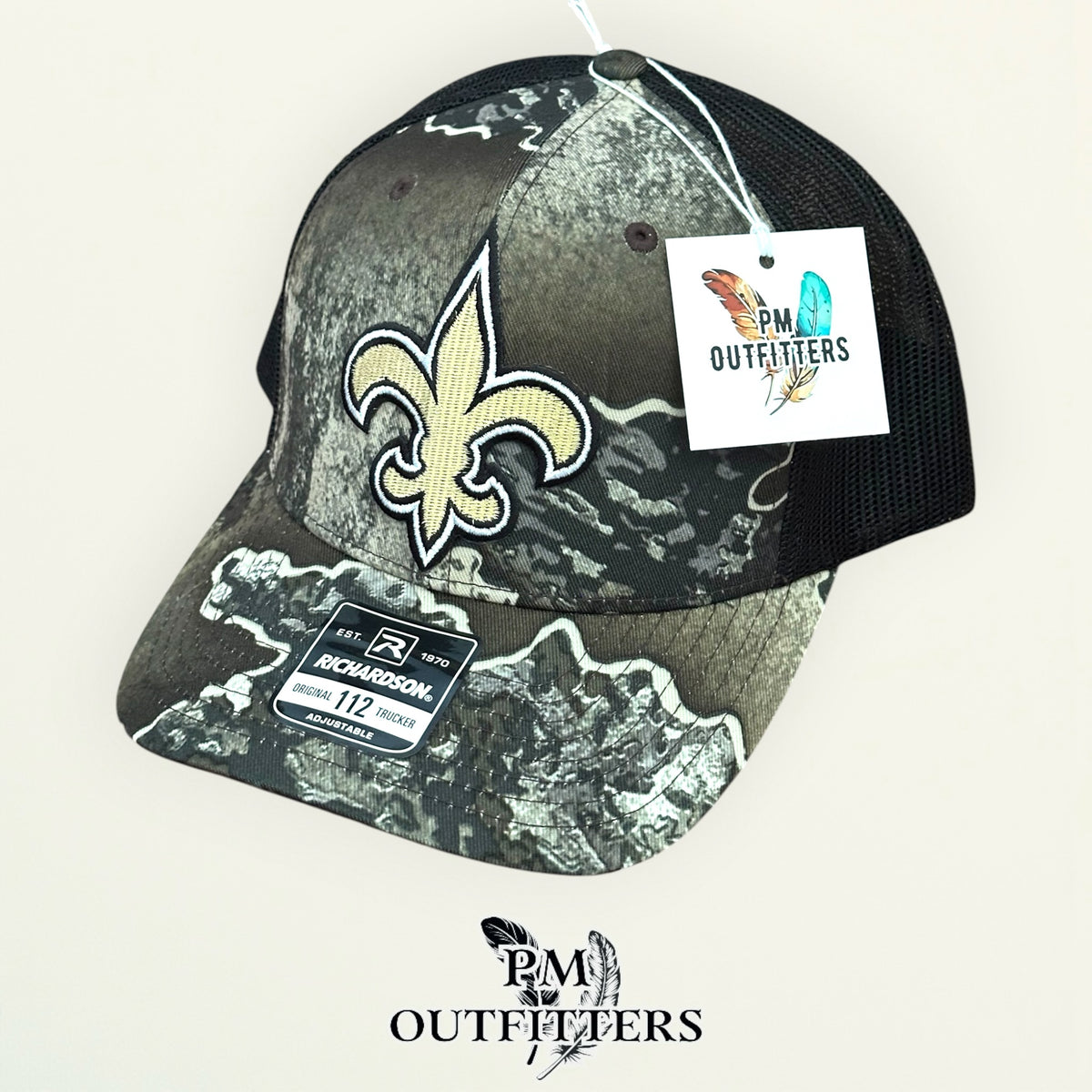 PM Outfitters New Orleans Saints fleur-de-lis embroidered patch Richardson 112 Realtree Excape camo trucker hat