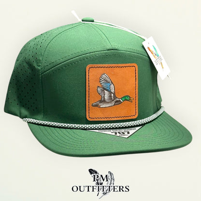 Green Kamel 707 performance rope cap with hand-painted mallard duck patch, angled view, PM Outfitters True Originals