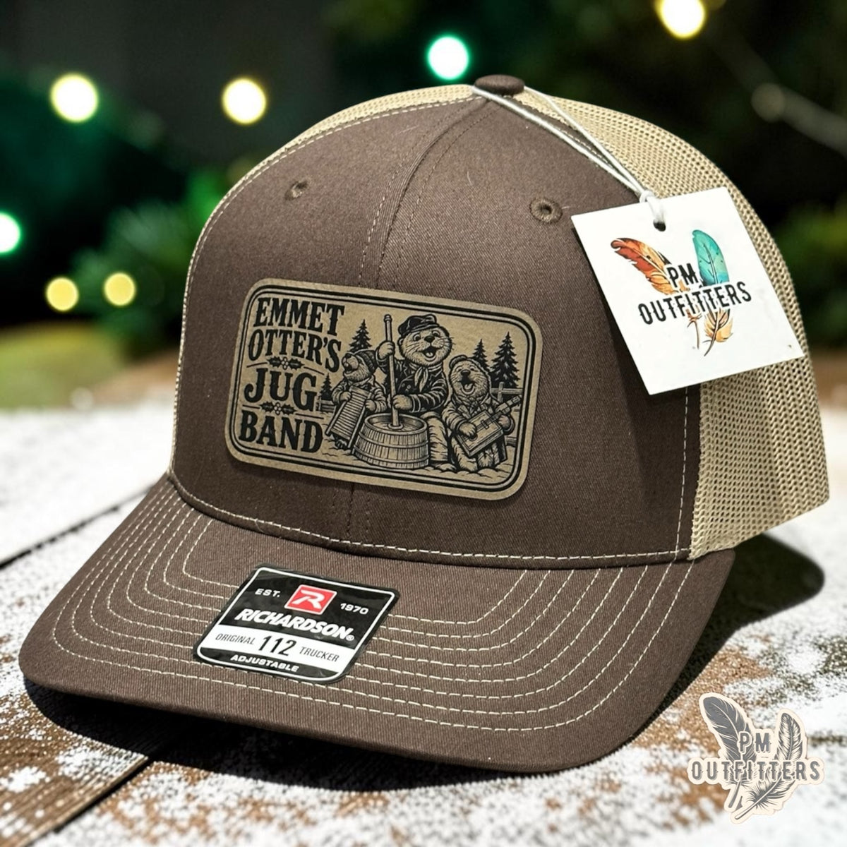 PM Outfitters Emmet Otter's Jug-Band Christmas trucker hat brown tan Richardson 112 vegan leather patch