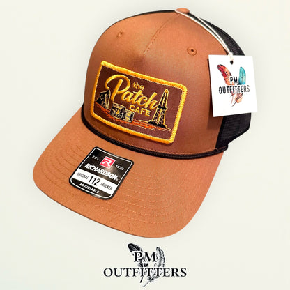 The Patch Cafe Oilfield Trucker Hat | Richardson 112 Rope | Caramel Black | Landman Hat