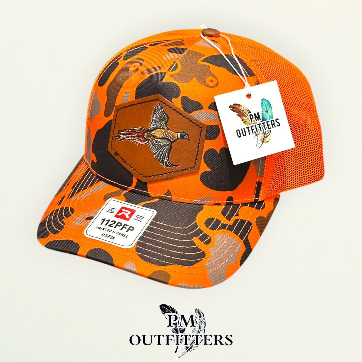 Hand-painted Pheasant patch on a blaze duck camo Richardson 112PFP trucker hat, PM Outfitters True Originals