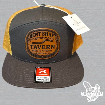 Bent Shaft Tavern Trucker Hat - Custom Leatherette Patch Richardson 168 | Grey Gold Flat Bill Humor Cap