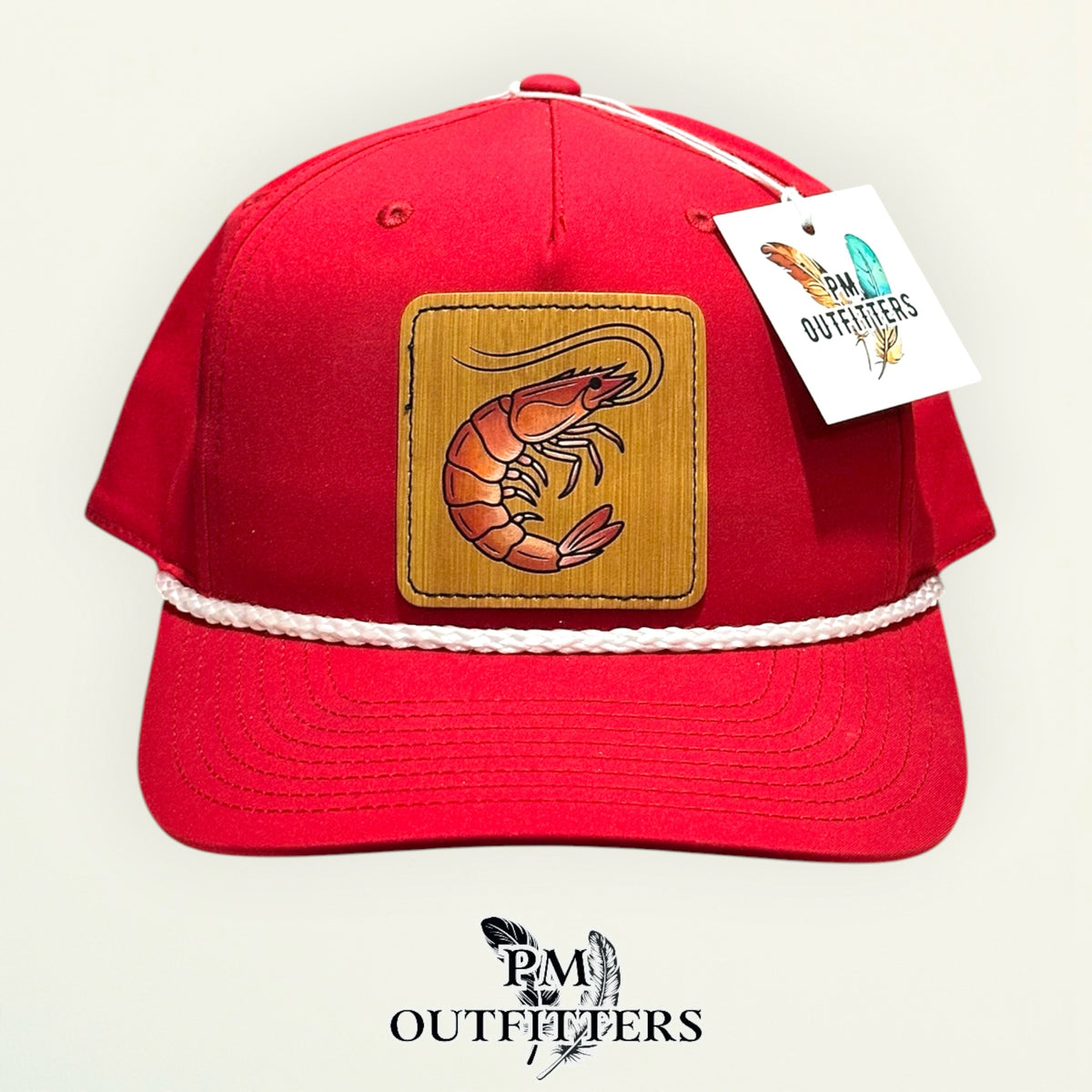 Hand-painted Gulf shrimp patch on a red Richardson 258 rope trucker hat with white trim, PM Outfitters True Originals