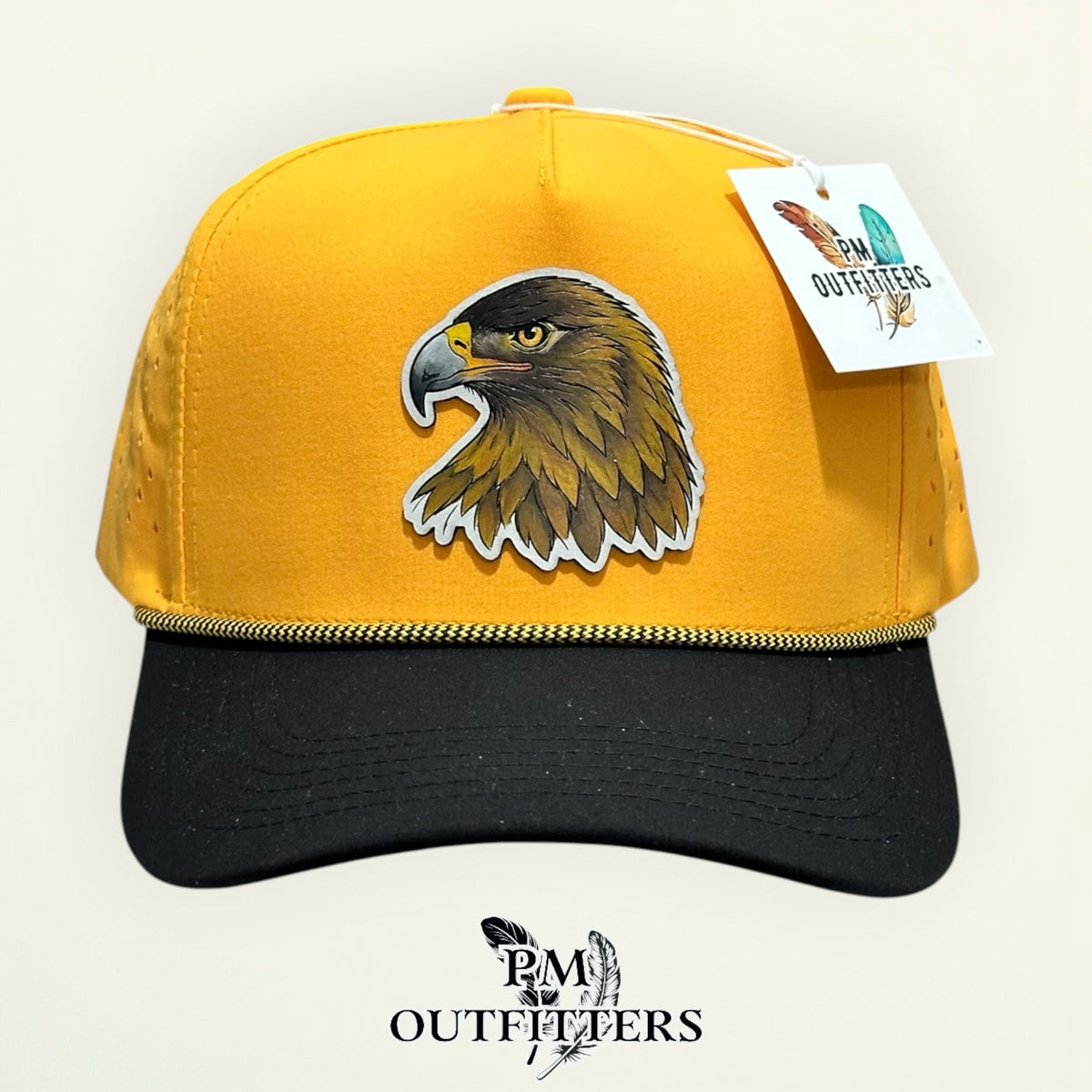 Side view of the hand-painted Golden Eagle patch on the black and gold Dallas 804 rope cap, PM Outfitters True Originals